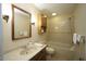 Bathroom with a combined shower-tub, single vanity and standard fixtures at 5200 Lorbacher Rd, Apex, NC 27539