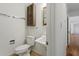 Half bath with vanity and cabinet storage at 611 Beaver Dam Rd, Raleigh, NC 27607