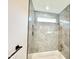 Spa-like bathroom with tiled walk-in shower, rain shower head and tiled niche storage at 622 Glascock St, Raleigh, NC 27604