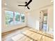 Bedroom features hardwood floors, white walls and trim, recessed lighting and bright windows at 622 Glascock St, Raleigh, NC 27604