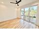 Bedroom featuring hardwood floors, large sliding glass doors and lots of natural light at 622 Glascock St, Raleigh, NC 27604