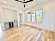 Bonus room featuring hardwood floors, wet bar with beverage center and lots of natural light at 622 Glascock St, Raleigh, NC 27604