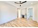 Bonus room featuring hardwood floors and wet bar with beverage center at 622 Glascock St, Raleigh, NC 27604