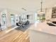 View of the dining room and kitchen featuring stylish furnishings and stainless steel appliances at 622 Glascock St, Raleigh, NC 27604