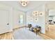 Spacious entryway with hardwood floors, stylish lighting, and easy access to the rest of the home at 622 Glascock St, Raleigh, NC 27604