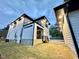 Exterior view of the home with a grassy lawn, dark trim, and modern design at 622 Glascock St, Raleigh, NC 27604