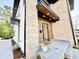 Inviting front entrance with stone accents and a wood-covered porch and tiled porch at 622 Glascock St, Raleigh, NC 27604