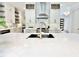 Kitchen island with a granite countertop and stainless steel appliances and fixtures at 622 Glascock St, Raleigh, NC 27604
