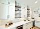 Kitchen with white countertops, stainless steel appliances and modern cabinets at 622 Glascock St, Raleigh, NC 27604