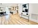 Open floor plan showcasing a kitchen with an island and seating, plus a dining area with stylish décor at 622 Glascock St, Raleigh, NC 27604