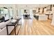 Bright, open-concept living space with a modern kitchen, dining area, and access to an outdoor patio at 622 Glascock St, Raleigh, NC 27604