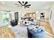 Bright and airy open-concept living room flows into kitchen and dining, creating a welcoming space at 622 Glascock St, Raleigh, NC 27604