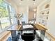 Bright office featuring hardwood floors, a modern desk, and built-in shelving for storage and display at 622 Glascock St, Raleigh, NC 27604