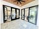 Covered patio with bluestone flooring seamlessly connects indoor and outdoor living spaces at 622 Glascock St, Raleigh, NC 27604