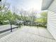 Relax on the outdoor patio with pavers and an attractive view of the landscape at 622 Glascock St, Raleigh, NC 27604