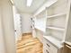 Organized walk-in closet with custom shelving, drawers, and ample storage space at 622 Glascock St, Raleigh, NC 27604