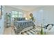 Cozy bedroom features a queen-size bed with stylish black and white patterned bedding and decor at 775 Old Graham Rd, Pittsboro, NC 27312