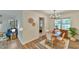 Open floor plan shows bright dining room, wood floors and living space at 775 Old Graham Rd, Pittsboro, NC 27312