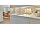 Kitchen and dining space featuring white cabinets and countertops, as well as stainless appliances at 775 Old Graham Rd, Pittsboro, NC 27312