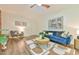 Cozy living room features modern decor, plush seating, and wood-look flooring at 775 Old Graham Rd, Pittsboro, NC 27312