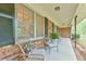 Spacious front porch with ample seating, perfect for enjoying the outdoors at 775 Old Graham Rd, Pittsboro, NC 27312