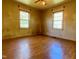 Bedroom with hardwood floors, dual windows and natural light at 810 Nancy St, Durham, NC 27701