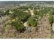 An aerial view of homes surrounded by green trees at 83 Calabria Ct, Clayton, NC 27527