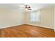 This bedroom features hardwood floors, crown molding, and a neutral color palette creating a relaxing and inviting atmosphere at 83 Calabria Ct, Clayton, NC 27527