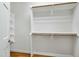 Walk-in closet features custom shelving and ample hanging space for organization at 83 Calabria Ct, Clayton, NC 27527