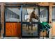 Interior view of a clean and well-maintained horse stall with a horse at 83 Calabria Ct, Clayton, NC 27527