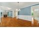 Open-concept living space featuring a fireplace, trim, and hardwood floors at 83 Calabria Ct, Clayton, NC 27527