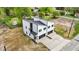 Aerial view of new construction duplex with modern design and spacious driveway at 834 Day Ave, Burlington, NC 27217