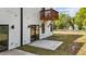 New construction backyard patio with sliding glass doors at 834 Day Ave, Burlington, NC 27217