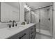 Elegant bathroom with dual sinks, decorative mirrors, and a luxurious glass shower at 834 Day Ave, Burlington, NC 27217