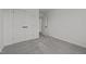 Neutral bedroom offers carpeting, a closet, and bright neutral walls at 834 Day Ave, Burlington, NC 27217