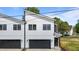 Exterior shot of the front of the home with a large 2-car garage at 836 Day Ave, Burlington, NC 27217