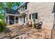 Charming brick home with a spacious patio and comfortable seating at 8409 Muirfield Dr, Fuquay Varina, NC 27526