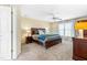 Spacious main bedroom with a ceiling fan and neutral-toned walls at 8409 Muirfield Dr, Fuquay Varina, NC 27526