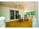 Charming porch with rocking chairs, ceiling fan, and access to the outdoors at 910 Old Orchard Rd, Chapel Hill, NC 27517