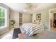 Comfortable bedroom with ample natural light and unique decor and furnishings at 910 Old Orchard Rd, Chapel Hill, NC 27517