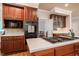 Kitchen island with cooktop, range, and built-in microwave and oven at 910 Old Orchard Rd, Chapel Hill, NC 27517