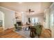 Spacious living room with fireplace, built-in bookshelves, and French doors at 910 Old Orchard Rd, Chapel Hill, NC 27517