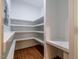 Walk-in pantry with wrap around shelves and wooden floors at 910 Old Orchard Rd, Chapel Hill, NC 27517