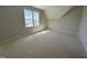 Bright bedroom featuring a dormer window providing plenty of natural light at 921 Lily Claire Ln, Fuquay Varina, NC 27526
