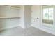 Walk-in closet featuring custom shelving at 921 Lily Claire Ln, Fuquay Varina, NC 27526