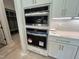 Modern kitchen appliances including a built-in microwave and oven at 921 Lily Claire Ln, Fuquay Varina, NC 27526