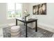 Office featuring desk, area rug, ottomans and natural light at 921 Lily Claire Ln, Fuquay Varina, NC 27526