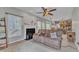 Cozy living room with fireplace and tile flooring, great for entertaining guests at 9332 Leslieshire Dr, Raleigh, NC 27615