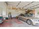 Attached garage with ample storage space and a car at 10 Gray Bass Ct, Zebulon, NC 27597