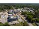 New construction of multi-story apartment buildings along a commercial corridor in a verdant area at 10 Shearin Ln, Youngsville, NC 27596